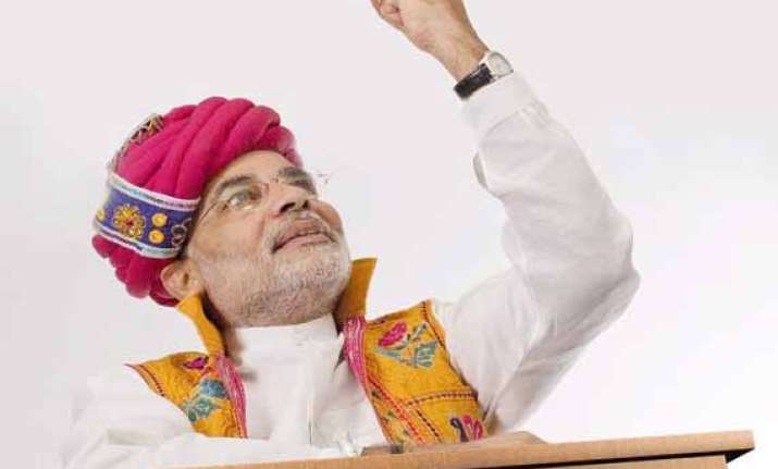 live let s have a face off modi dares rahul at barpeta