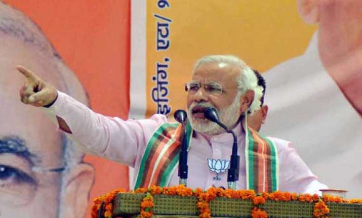 live gandhi family is arrogant and power drunk says modi in