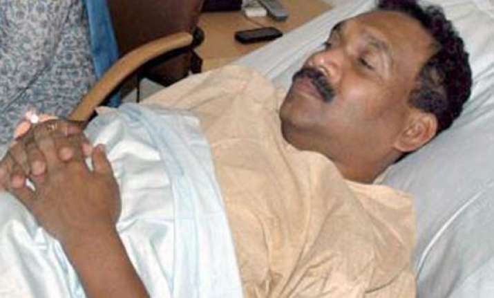 madhu koda walks out of jail after 44 months