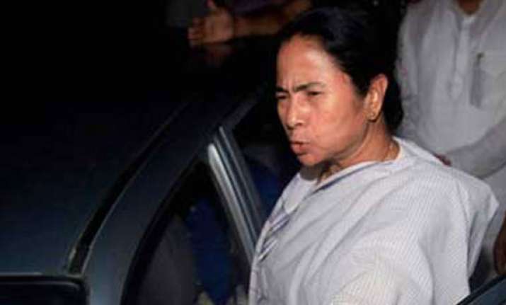 mamata ties rakhis on wrists of policemen journalists