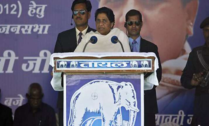 mayawati lashes out at congress says it is misleading people
