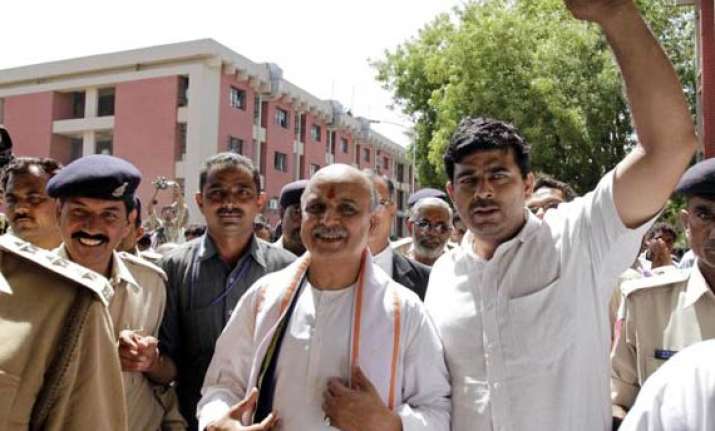 mere law against corruption not enough togadia