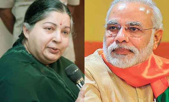 modi assures jaya of absolute cooperation between centre tn