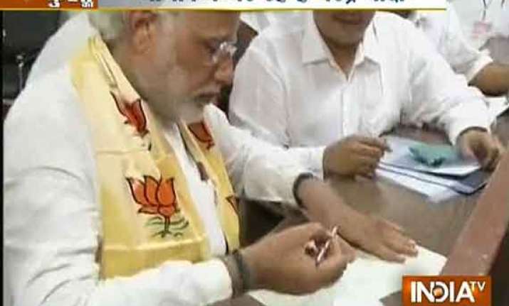 in pics narendra modi files nomination after mega road show