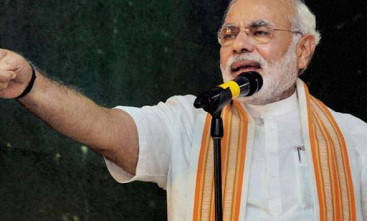 modi invokes gandhi for nation s development