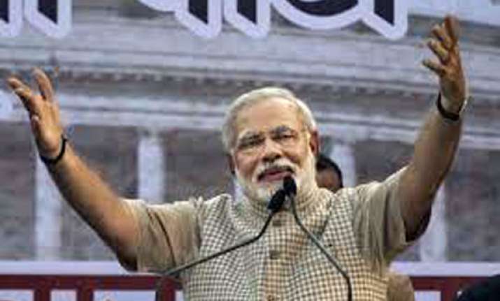 narendra modi once sold tea now will govern india