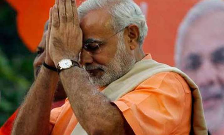 narendra modi pays homage to rajiv gandhi on twitter