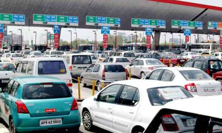opposition attacks bjp on toll tax hike