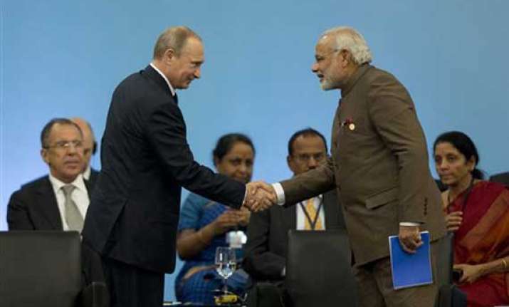 pm modi meets putin favours broadening of strategic