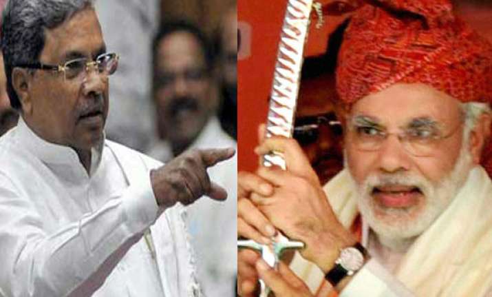 poll panel raps siddaramaiah for calling modi mass murderer