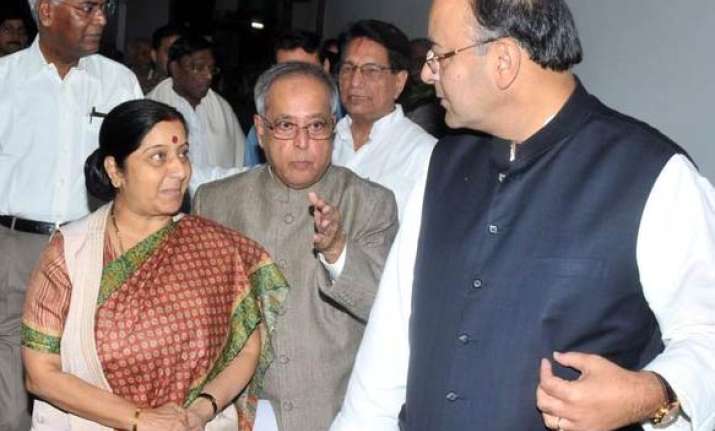 pranab meets sushma jaitley in a bid to break jpc logjam