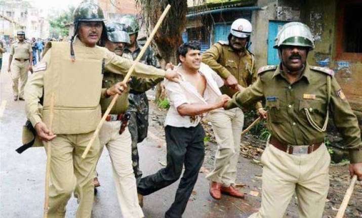 protests in lok sabha over police action in belgaum