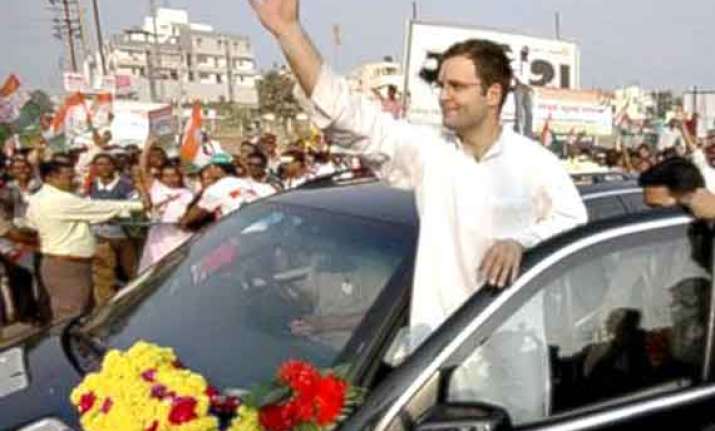 rahul again hits out at gujarat development model