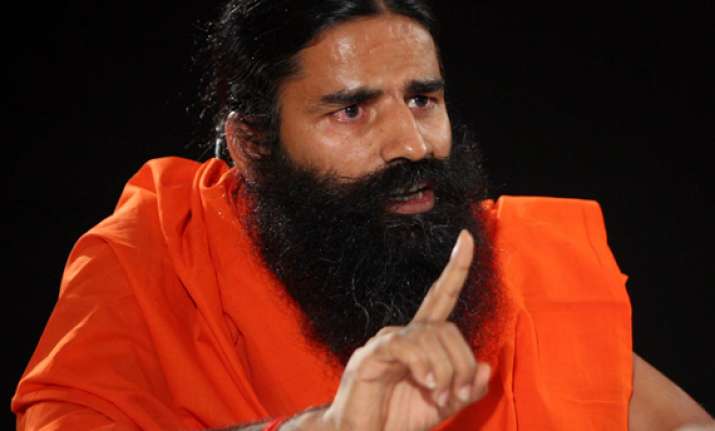 ramdev slams sonia gandhi over land lease