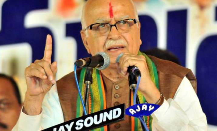 scams tarnishing india s image abroad advani