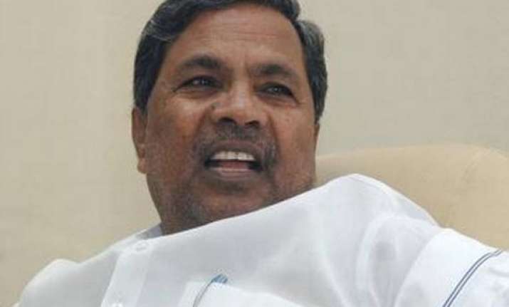 siddaramaiah warns officials of strict action for laxity