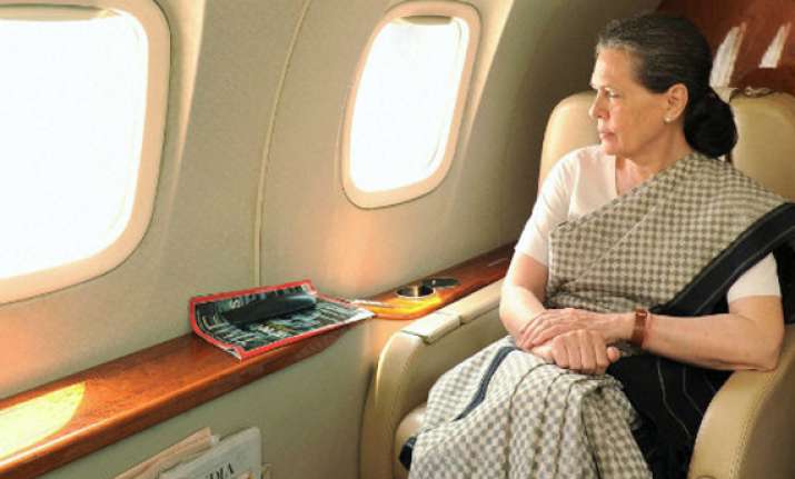 sonia surveys flood hit uttarakhand seeks quick relief for