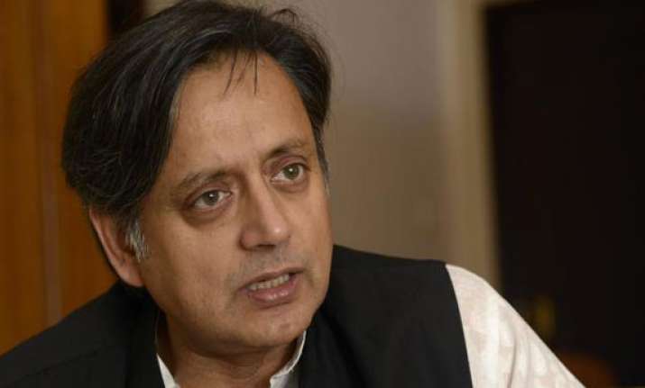 tharoor jibe at modi let s hope sharif is served biryani