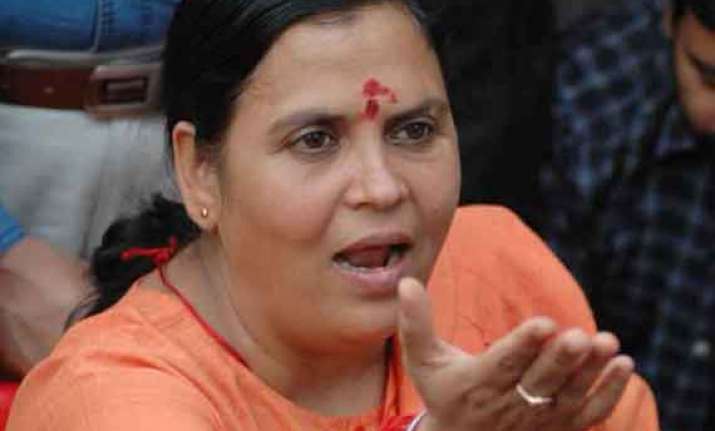 uma bharti cautions officials against maoist elements in