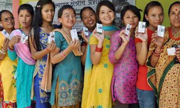 voters greeted with yellow roses at model polling station