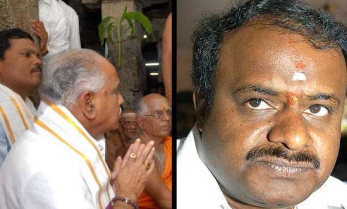 yeddy offers prayers kumaraswamy takes truth test