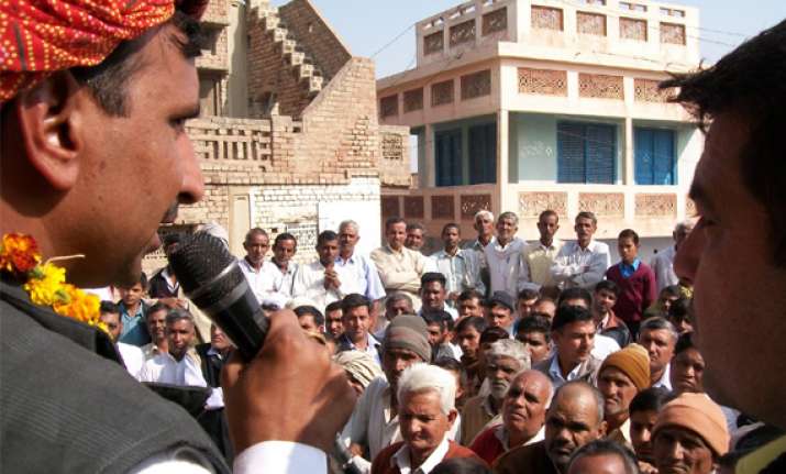 youth slaps congress mla at election meeting