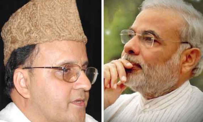 modi watches in silence as his critic mahmood gives