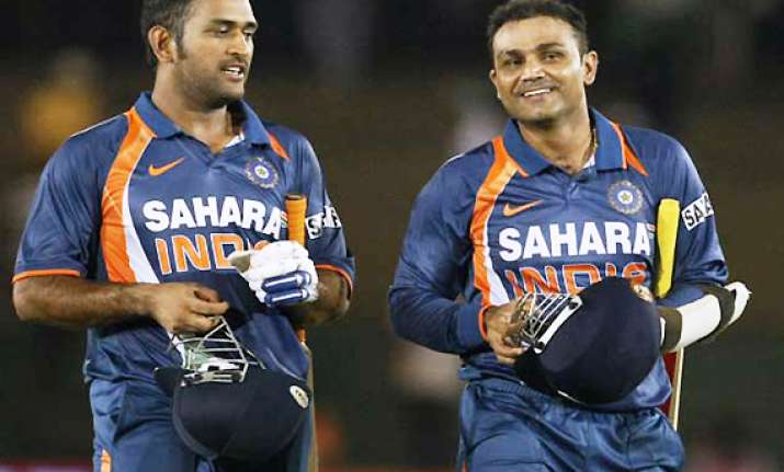 bcci steps in asks dhoni sehwag to ensure team unity