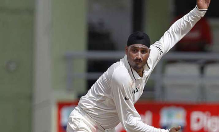 back in test squad harbhajan leads punjab to ranji win