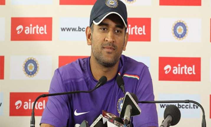 dhoni evades questions on ipl spot fixing with a smile