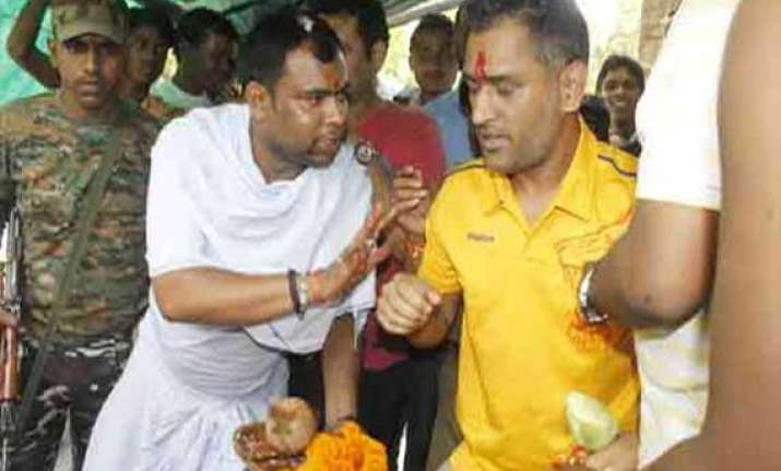 dhoni seeks divine intervention after back to back losses