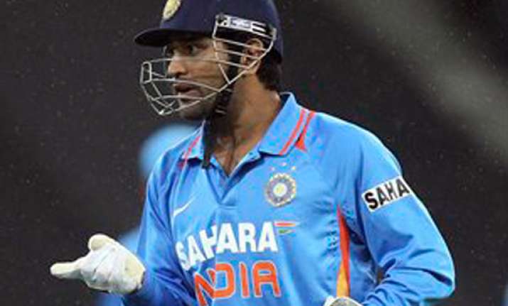 dhoni blames bowlers for tame defeat against australia