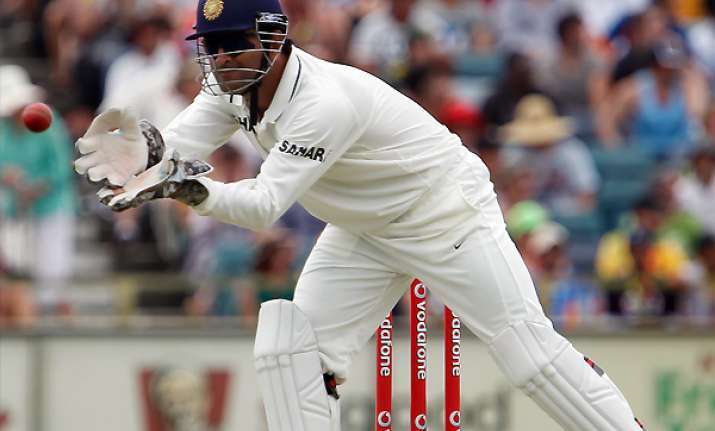 dhoni handed one match ban for slow over rate