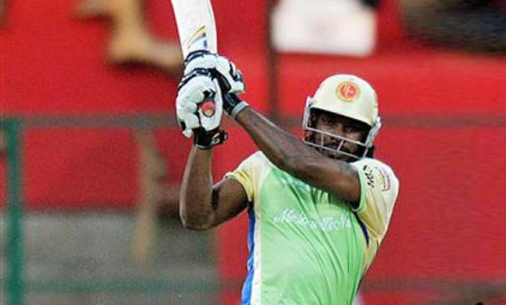 gayle blitzkrieg helps rcb beat kkr takes them to play offs
