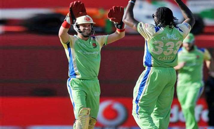 gayle dilshan steer rcb to easy win against kochi tuskers