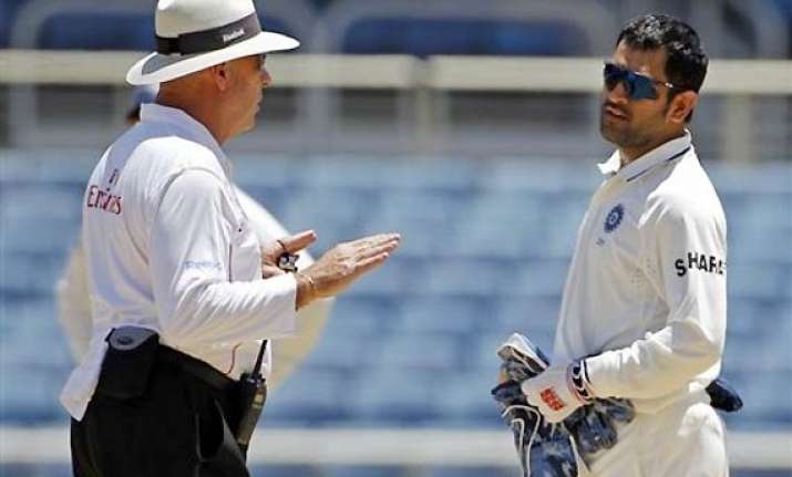 harper claims dhoni tried to intimidate him