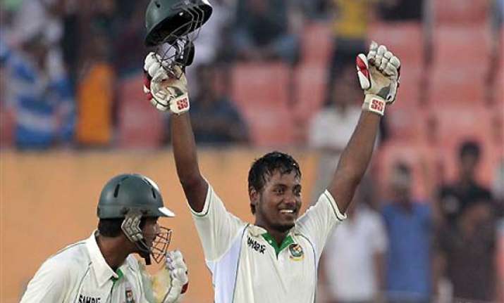 hasan lifts bangladesh with debut hundred