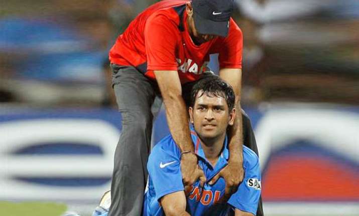hectic schedule will drain players says dhoni