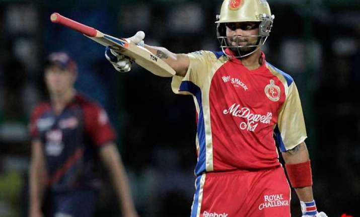 kohli leads rcb to narrow win over daredevils