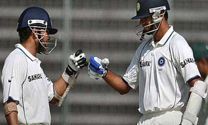 i ll miss dravid in the dressing room says sachin