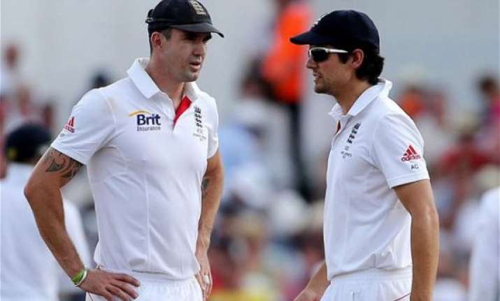alastair cook hits back at pietersen defends team mates