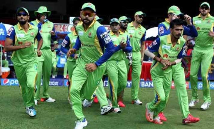 ipl 8 rcb through to play offs after match called off