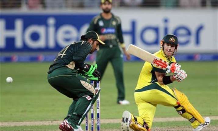 pak vs aus smith warner hit 50s to guide australia to 231 9