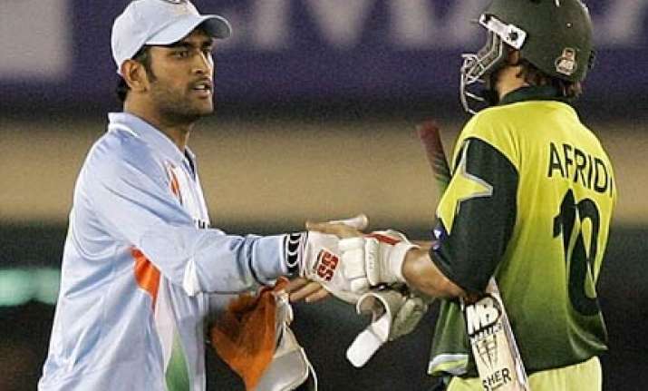 dhoni afridi bat for unicef project