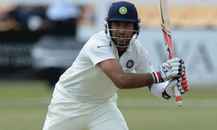 pujara scores a half century for yorkshire