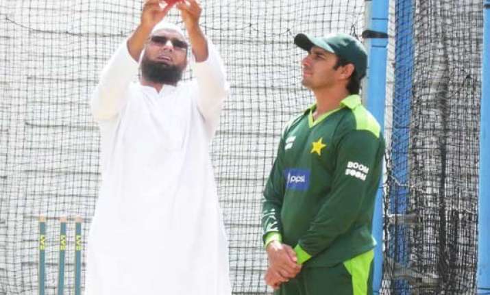 ajmal bowls with revamped action under saqlain s supervision