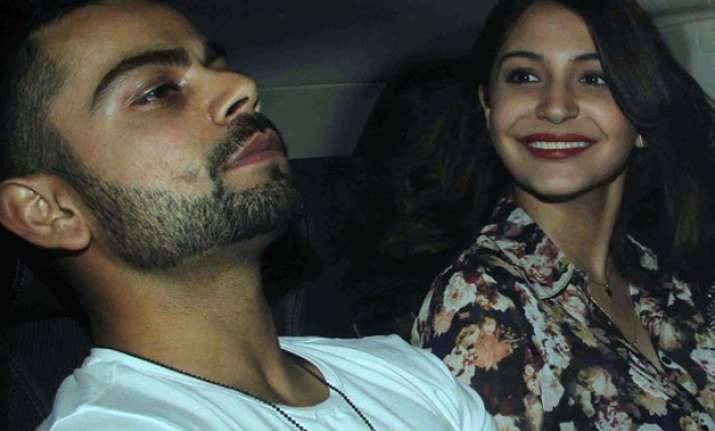 team india members arrive home kohli anushka land in mumbai
