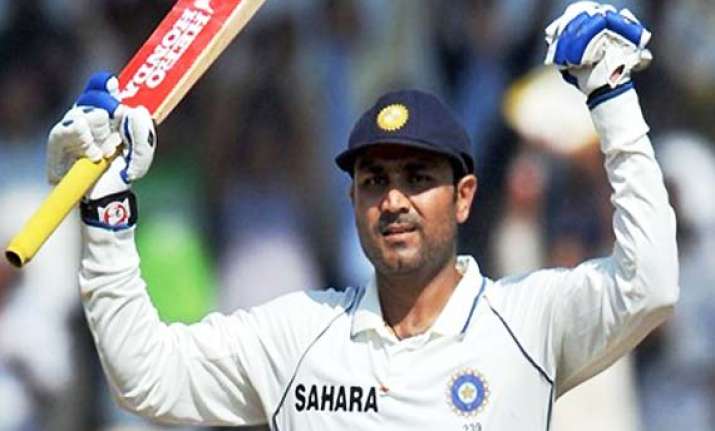 sehwag cracks a whirlwind ton pujara 98 not out