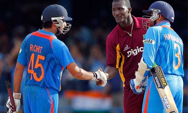 rohit steers india to four wicket win over wi in 1st odi
