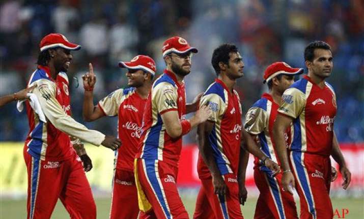 kohli gayle lead rcb to 26 run win over pune